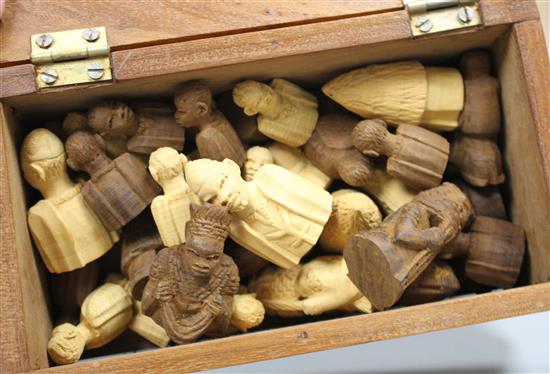 An East African carved wood chess set, kings 5cm, in carved hardwood box, possibly from The Cameroon